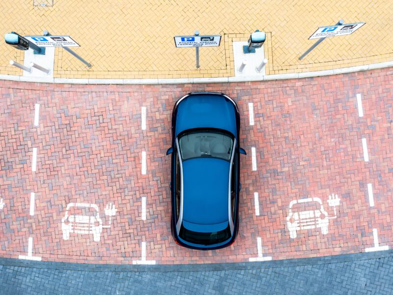 Aerial,View,Directly,Above,An,Electric,Vehicle,Charging,Station,With