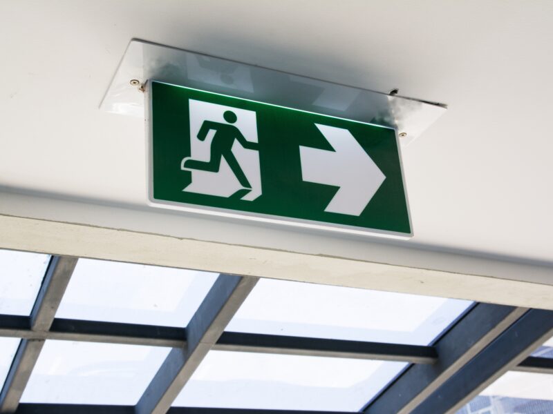 Emergency,Fire,Exit,Sign,At,The,Corridor,In,Building