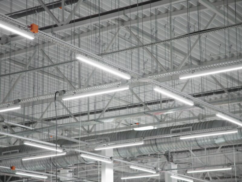 Empty,Factory,Interior,Or,Storehouse.,Warehouse,Roof,With,Lighting,Equipment